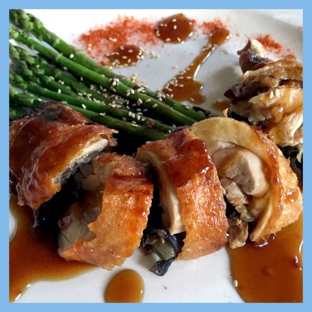 Guineafowl stuffed with Orange capped Boletes with teriyaki sauce